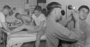 Soldiers being examined by medical staff